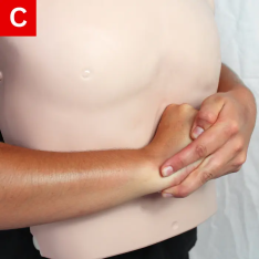 CPR Figure 18 C With your other hand, hold the first fist and press forcefully into the abdomen and up toward their chest