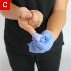 BBP Figure 5 C Peel the glove towards your fingers, encasing the first glove in it