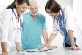 medical professionals reviewing fema and cms information