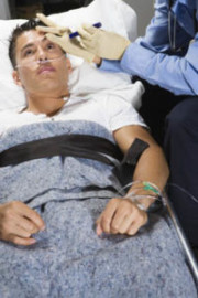 man in hospital bed