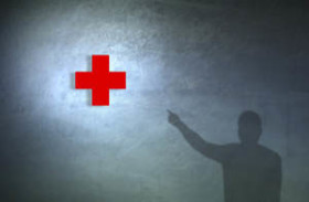 red cross with instructor pointing