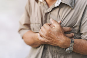 man-experiencing-chest-pain