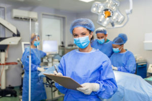 certified-medical-assistant-holding-a-clipboard