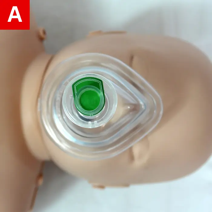 CPR-Figure-27-A Secure the mask over the infant’s nose and mouth