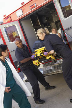Ambulance With EMT Personnel And Patient