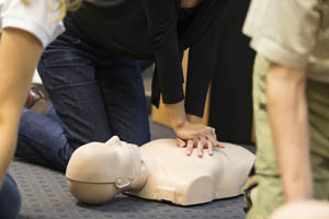 CPR First Aid Class Using Mannequin