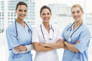 three female nurses standing together