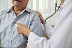 doctor-checking-on-old-mans-heart-health-t